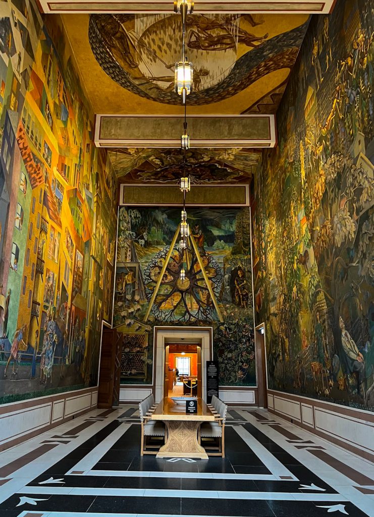 Room covered in murals in Oslo's City Hall