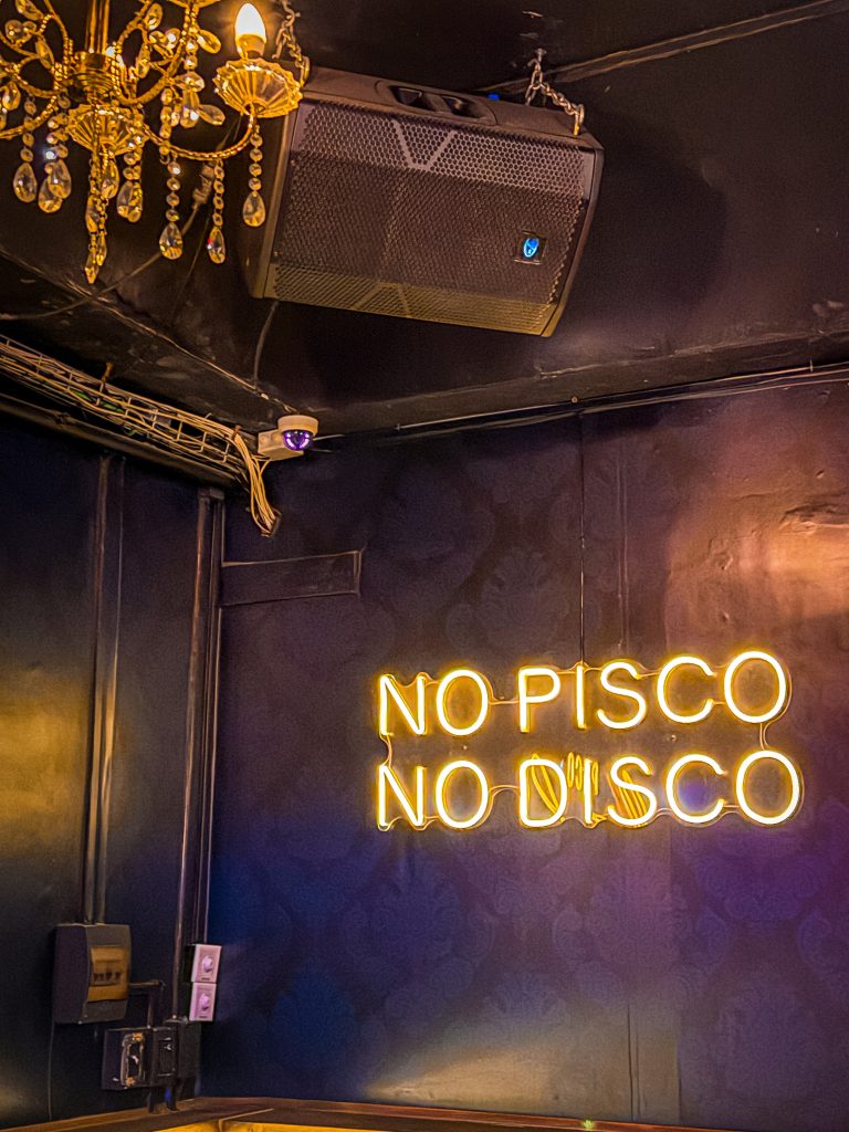 Candelaria nightclub neon sign saying no pisco no disco