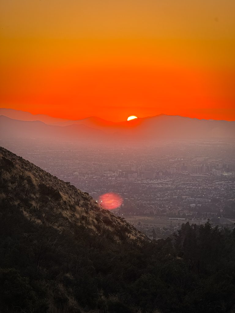 Sunset from Quebrada de Macúl overtop all of Santiago Chile