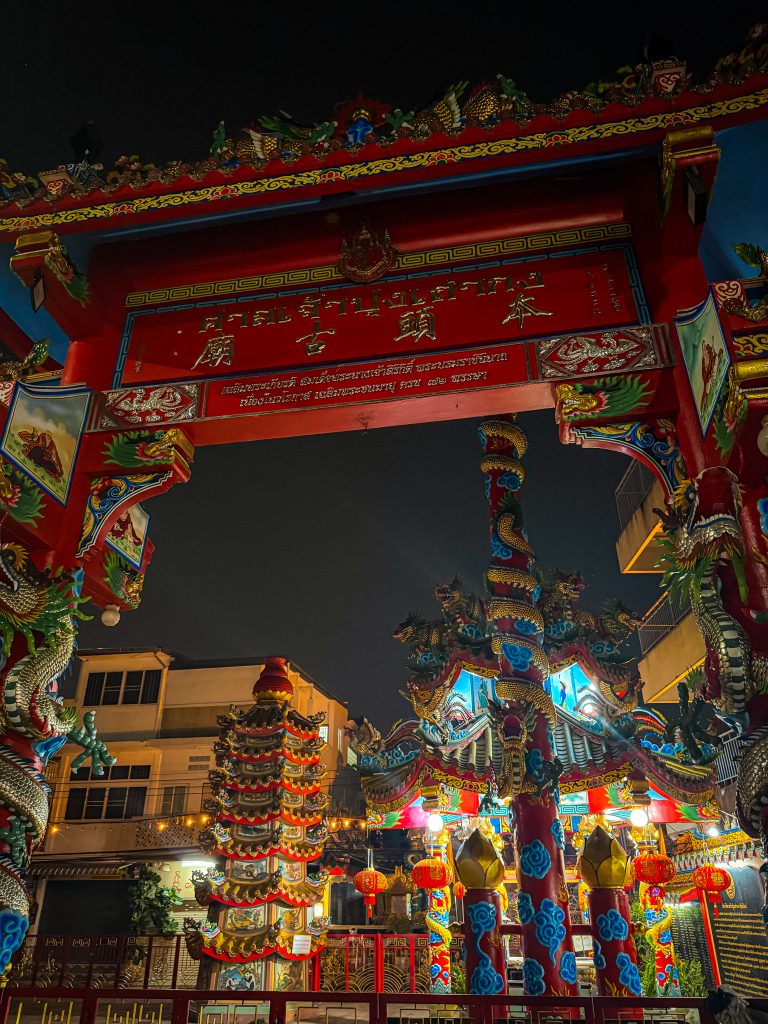 Buddhist temple gates at night
