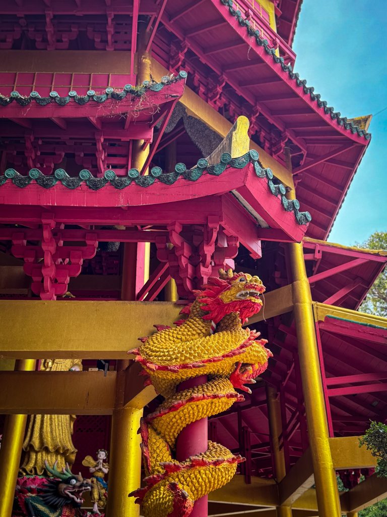 Golden dragon wrapped around a column on the Chinese-style pagoda at Tiger Cave Temple