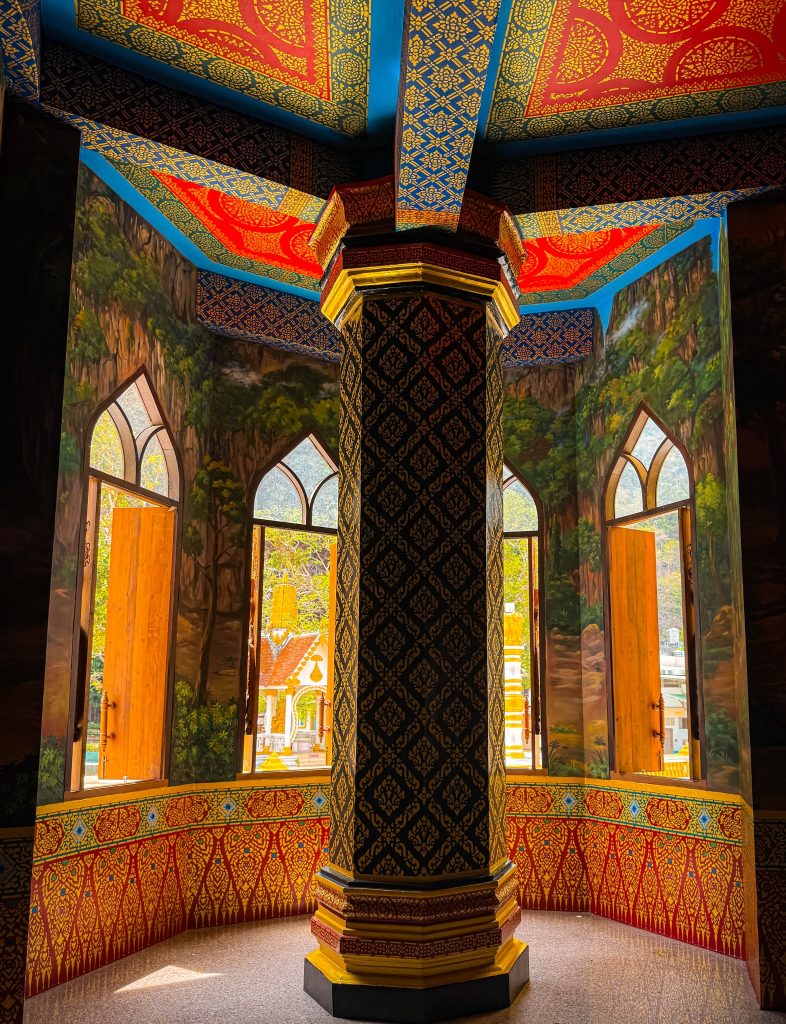 Patterned pillar and open arched windows inside Tiger Cave Temple