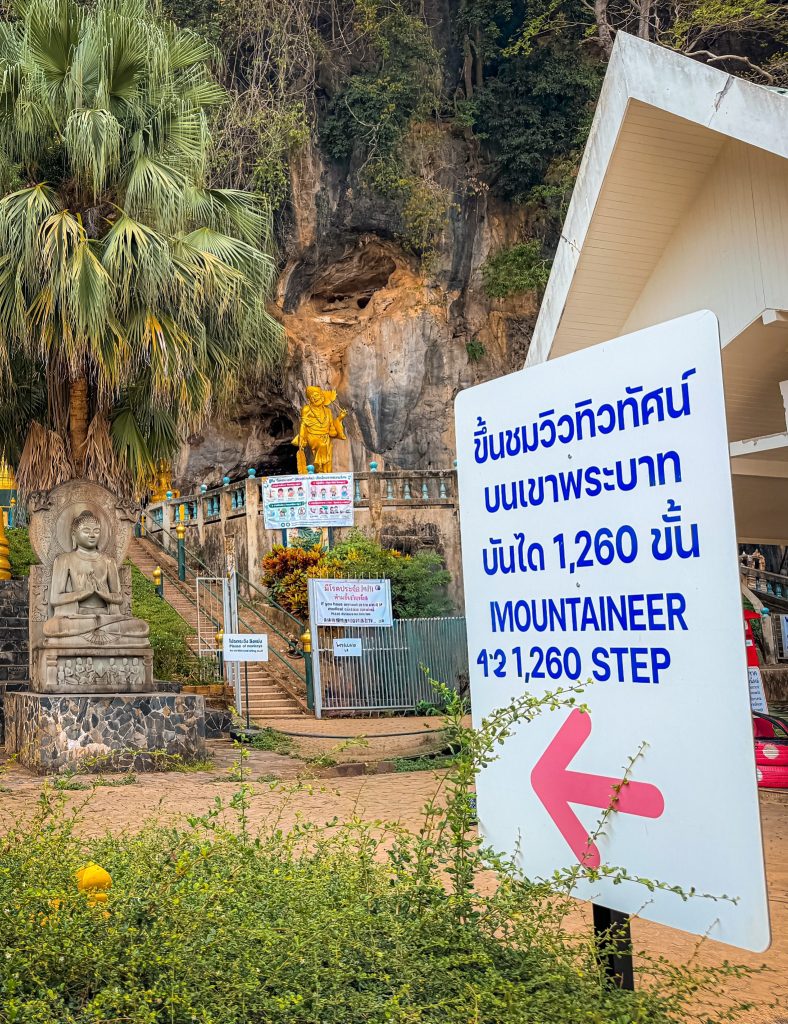 Sign marking the start of the 1,260 steps at Tiger Cave Temple in Krabi