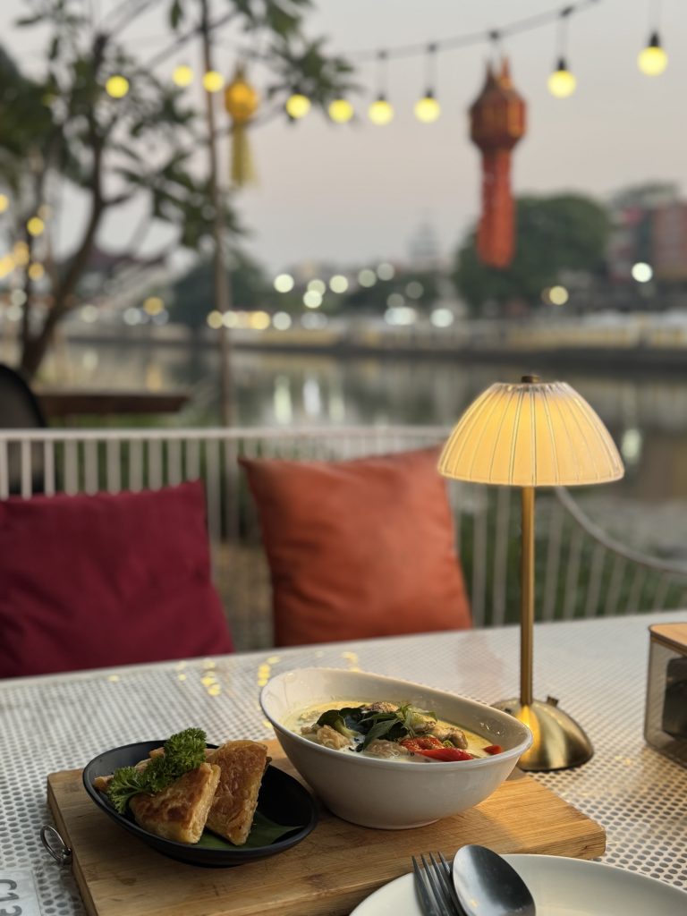 Green curry dinner next to the river in Chiang Mai