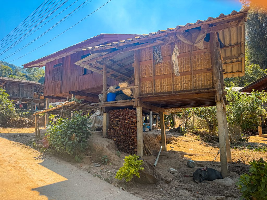 Wooden house on stilts in a traditional Karen village in Thailand