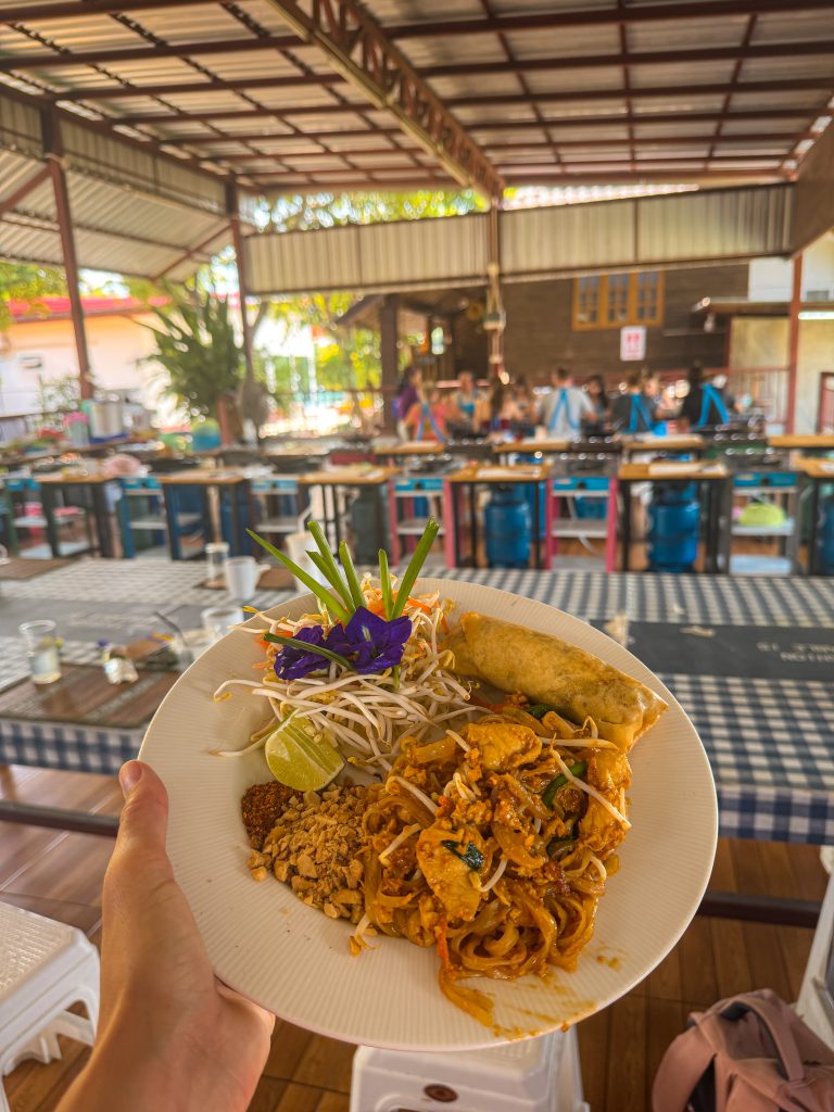 Plate of pad thai cooked on a Thai cooking tour
