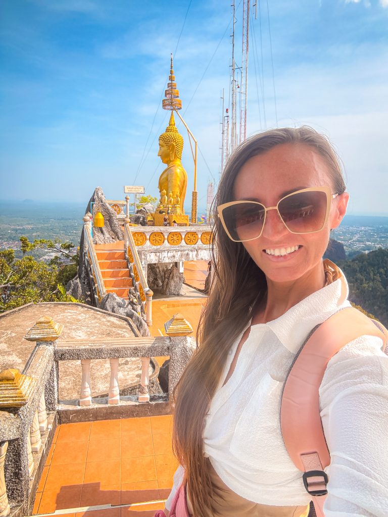 Woman at the top of Wat Tham Suea temple