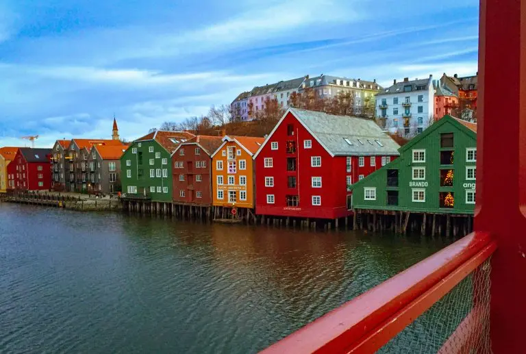 Colorful houses along riverfront in Trondheim, Norway