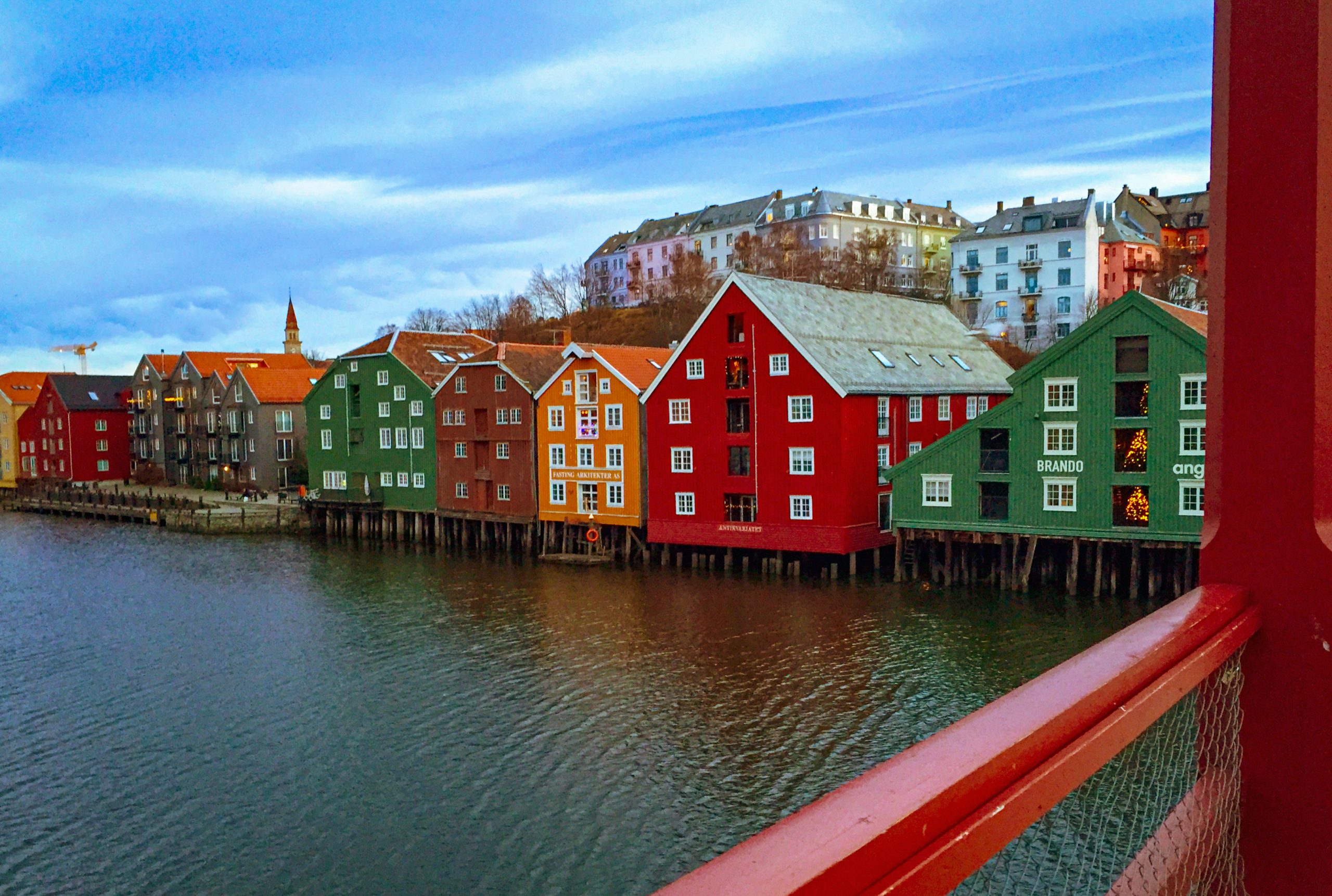 Colorful houses along riverfront in Trondheim, Norway