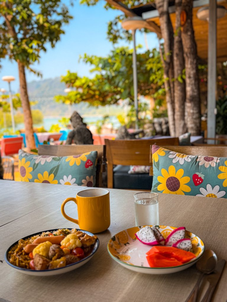 Breakfast plate and tropical fruit served with an ocean view at Villa Cha-Cha Krabi.