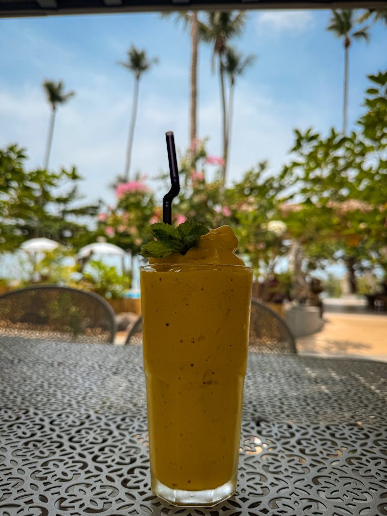 Fresh mango smoothie topped with mint at Villa Cha-Cha Krabi Beachfront Resort.
