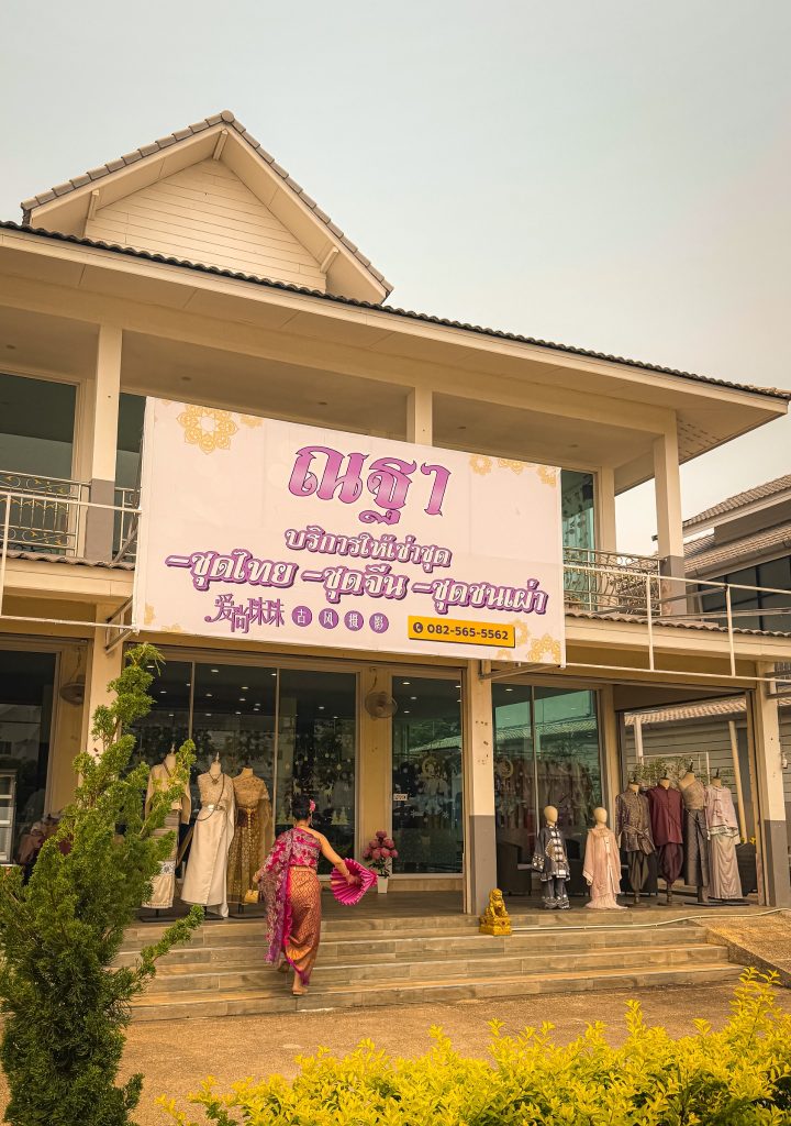 Exterior of a traditional Thai dress rental shop near the White Temple in Chiang Rai.
